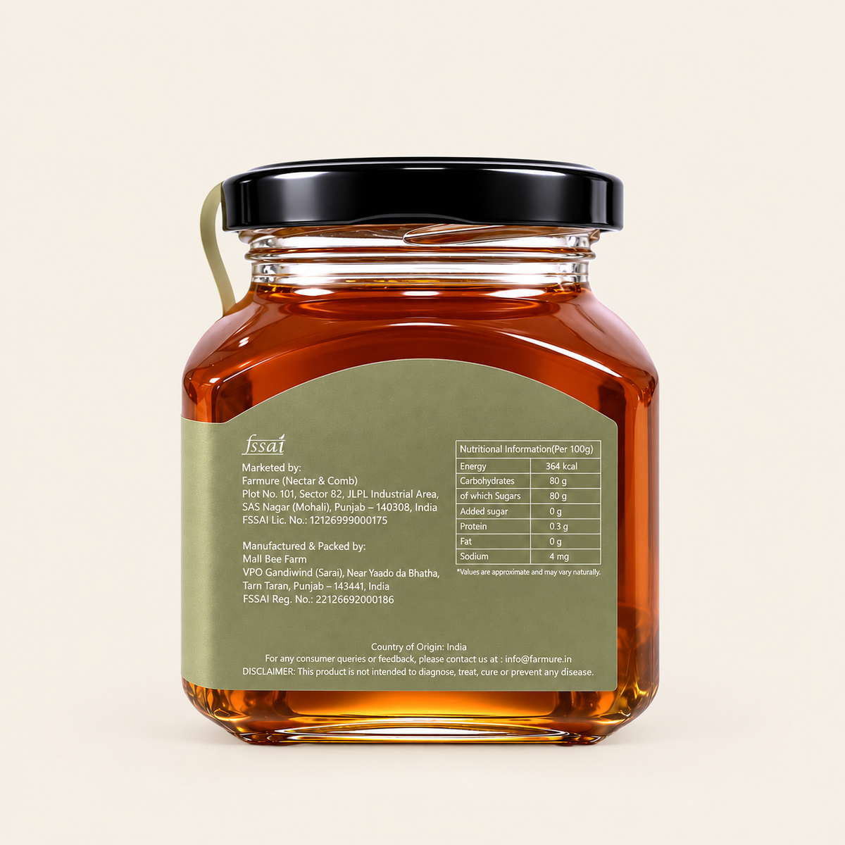 A glass jar of Eucalyptus Honey, showing the back label with nutritional information, set against a solid off-white background.