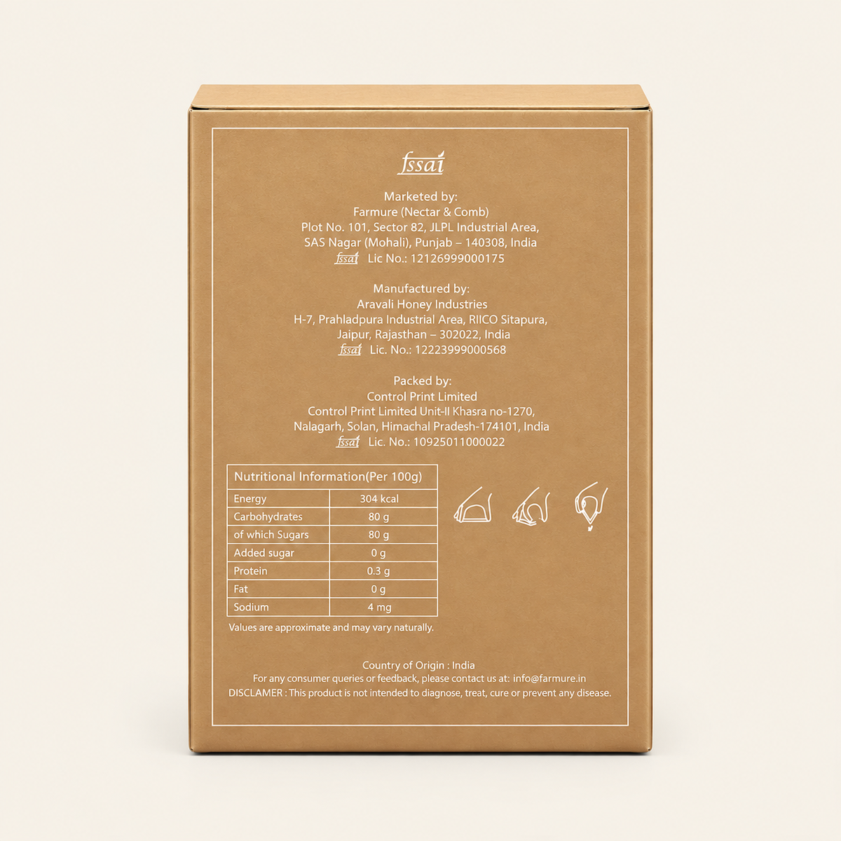 The back of a kraft paper box with printed product details, a nutrition facts table, and small icons, photographed against a plain light beige background.