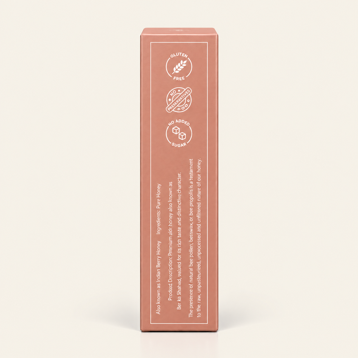 A tall, rectangular product box in a muted dusty rose color, standing upright against a light cream background. The front of the box features white icons indicating 'Gluten Free', 'Sugar Free', and 'No Artificial Sugar', along with descriptive text.